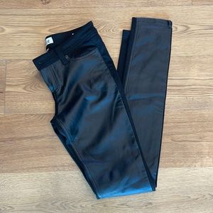 Vegan leather pants in front. Cotton in the back. Sz. 7